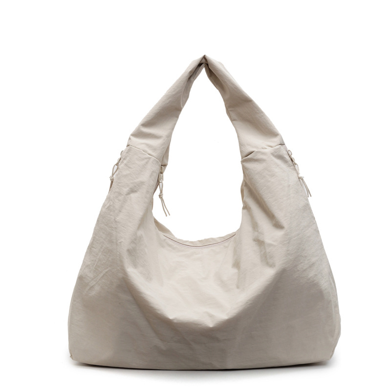 クロスボーダー大容量人気の気質脇の下バッグ 2025 新しいファッションナイロン布ショルダーバッグレトロハンドヘルドレディースバッグ