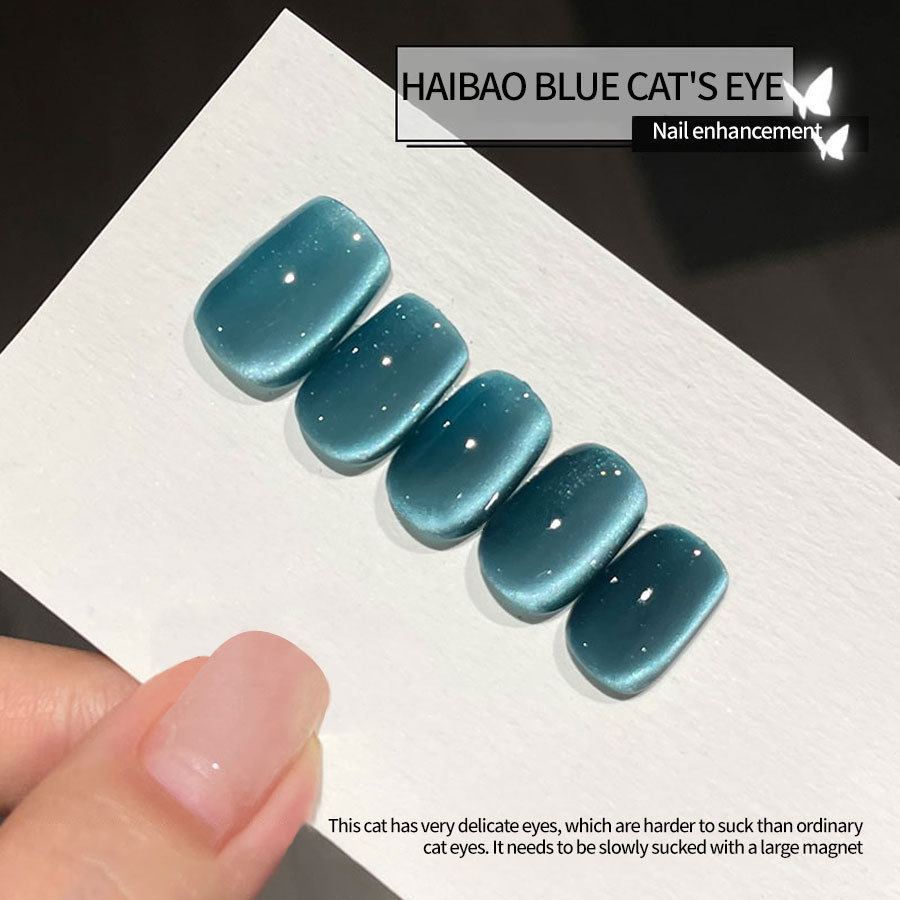 2023 new online celebrity bright ocean blue treasure flashing cat eye gel flashing reflective popular color white small set manicure DI