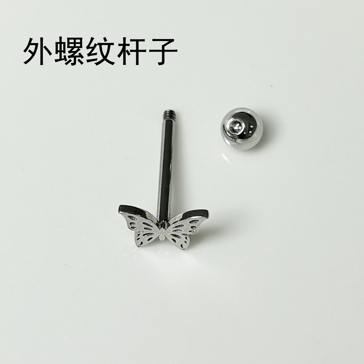 Silver pointed spike labret stud material detail