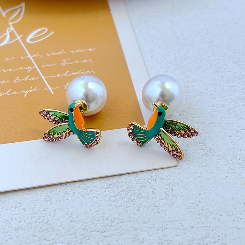 Elegant Cute Bird Imitation Pearl Copper Plating Zircon Women's Ear Studs 1 Pair display picture 2