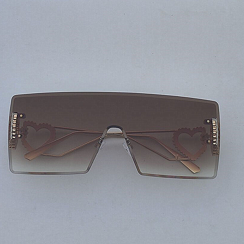 Occhiali da sole rotondi rétro da donna con montatura nera moda_voghion.com
