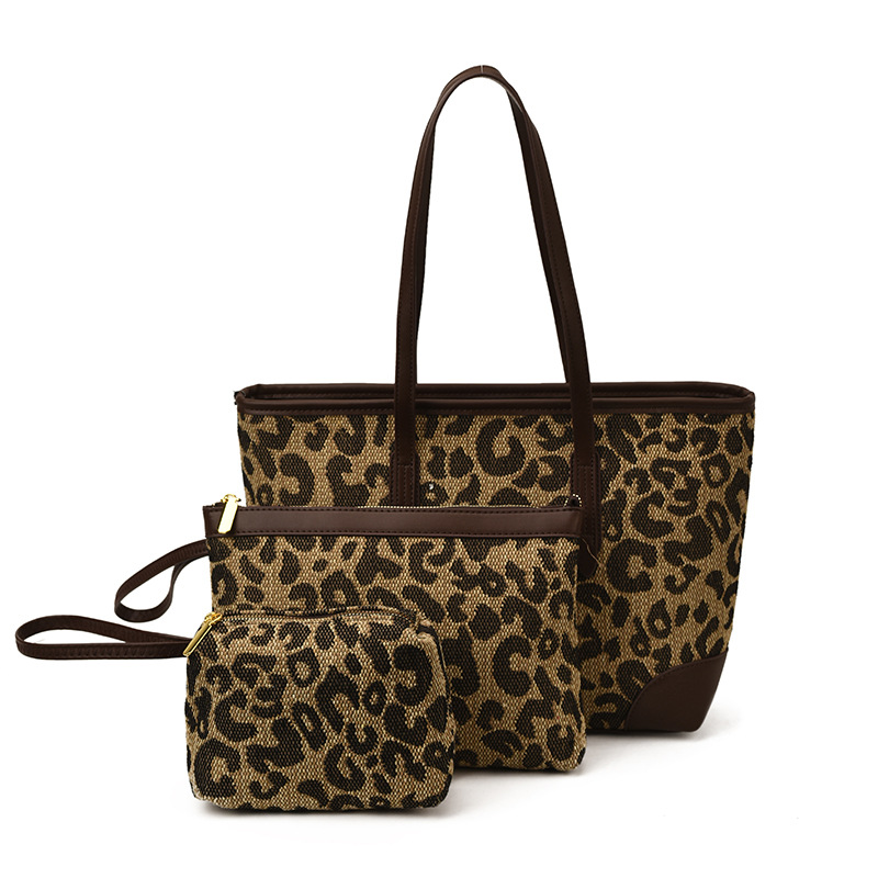 Bolsa para mujeres 2025 nuevo nicho coreano leopardo mochila de hombro de alta capacidad de tres piezas paquete especial