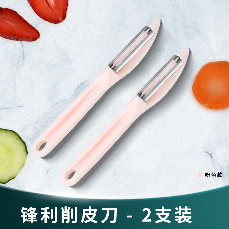 Una gran cantidad de regalos de frutas peeladas cuchillo de peel de raspador de acero inoxidable cocina doméstica sala de carpintería