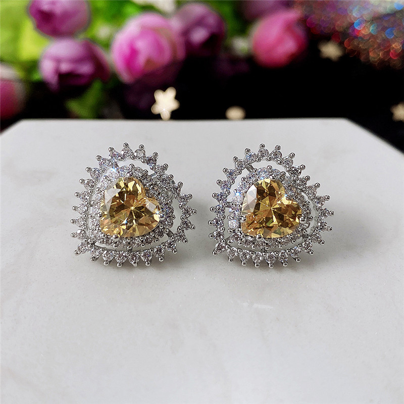 Fashion Hollow Heart Zircon Heart Copper Earrings Wholesale display picture 2