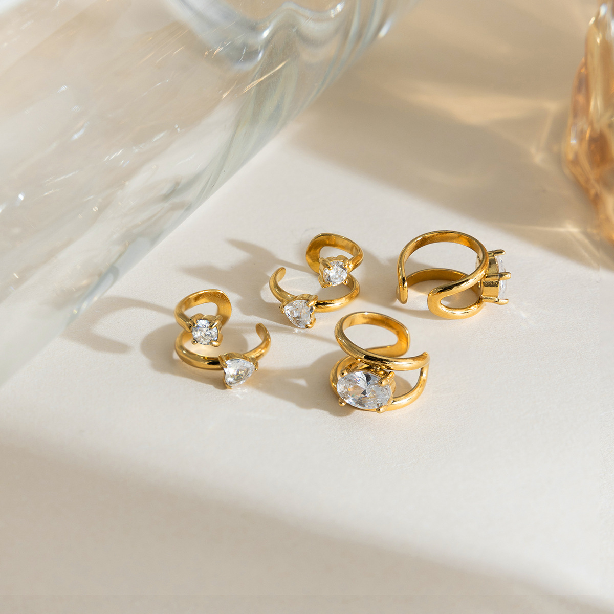 Wanxing europa y americana galvanizado 18K oro simple diamante auriculares de acero inoxidable personalidad transfronteriza universal no desvanecer auriculares mujeres