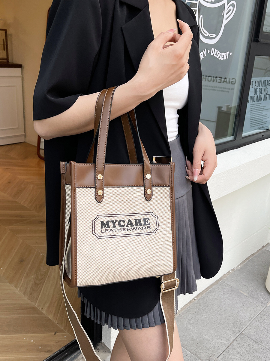 Nuevo cross-border bolso de empalme de color para mujeres 2025 verano lienzo de moda mochila de hombro simple bolsa de viaje image 3