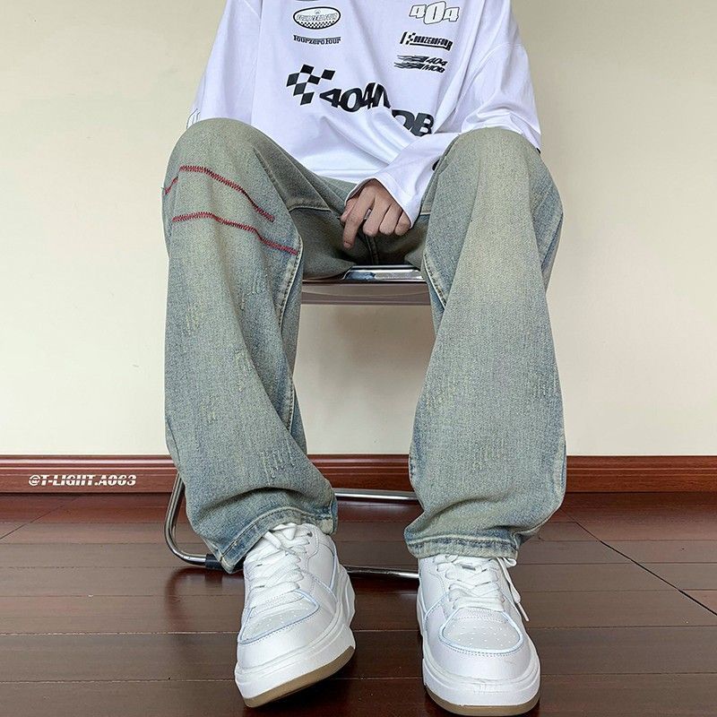 Nuevo producto Trend American White Retro Bordado Scratch Old Jeans Pantalones sueltos Hombres y mujeres Trendy Long