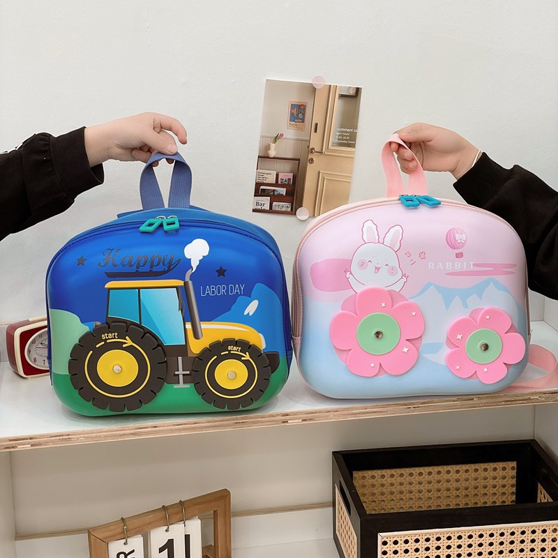 Mochila infantil de casca dura de dibujos animados de moda para niños ingeniería de automóviles ligeros mochila divertida para niñas conejos pequeños y medianos