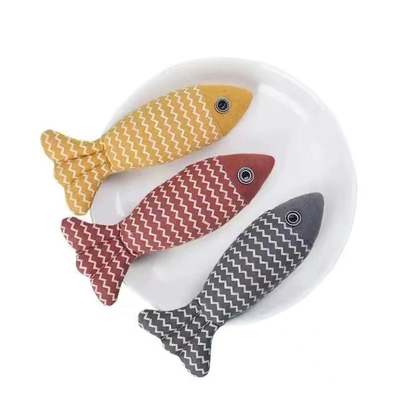 新商品の猫のおもちゃの麻のミントのぬいぐるみのシミュレーション魚は枕を抱いて猫の棒をからかうことに耐えます。|undefined