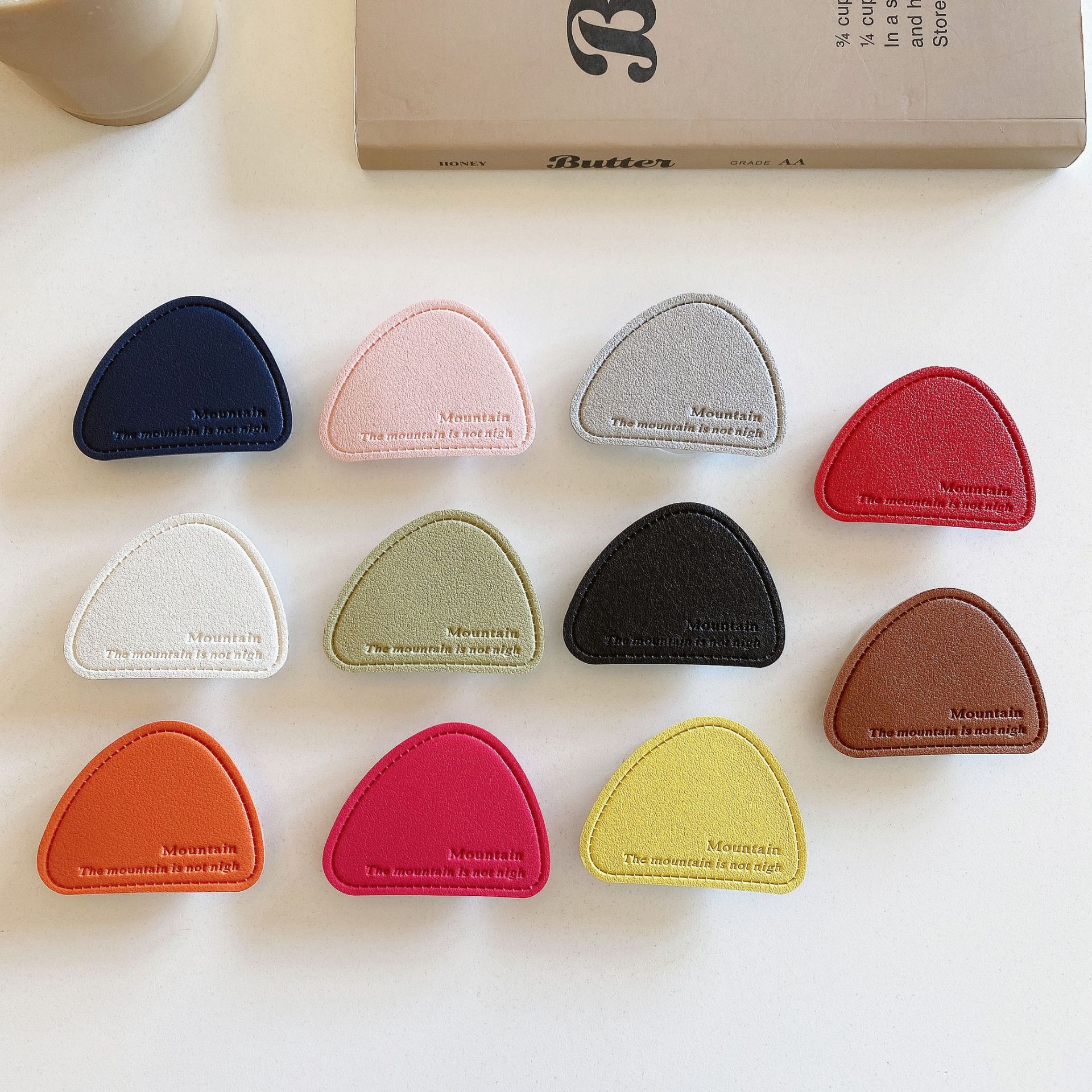 Trendy Minimalist Ins-Style Fashion Irregular Leather Magnetic Airbag Phone Holder with Multiple Color Options Trendy Style