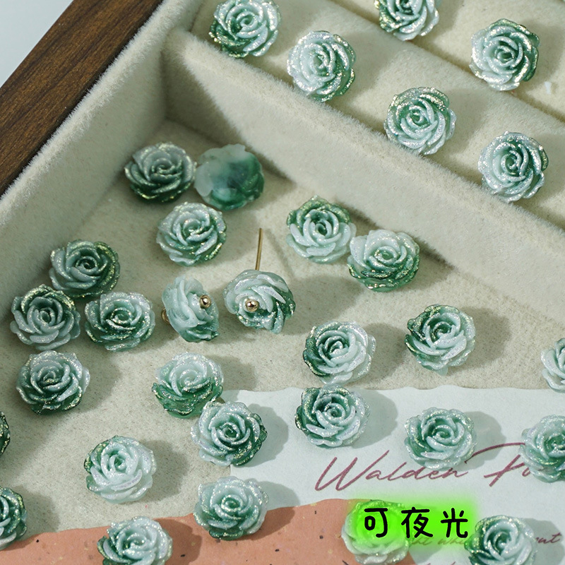 穴のない細いキラキラの柔らかいゴムの花の光はバラの花の片面の彫刻のdiyの手作りの数珠のネイルの携帯電話のケースの材料を変えます。