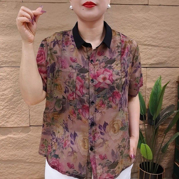 Douyinの人気のドロップシッピング2025夏の新しいファッショナブルでルーズな年齢を軽減するラペルプリント半袖シャツ|undefined