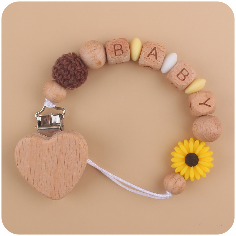 Nuevo bebé haya melocotón corazón calmante bebé DIY dibujos animados Margarita cuentas de silicona mordedura pezón cadena