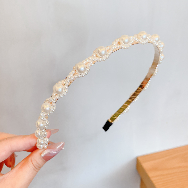 27#19 interlocking pearls