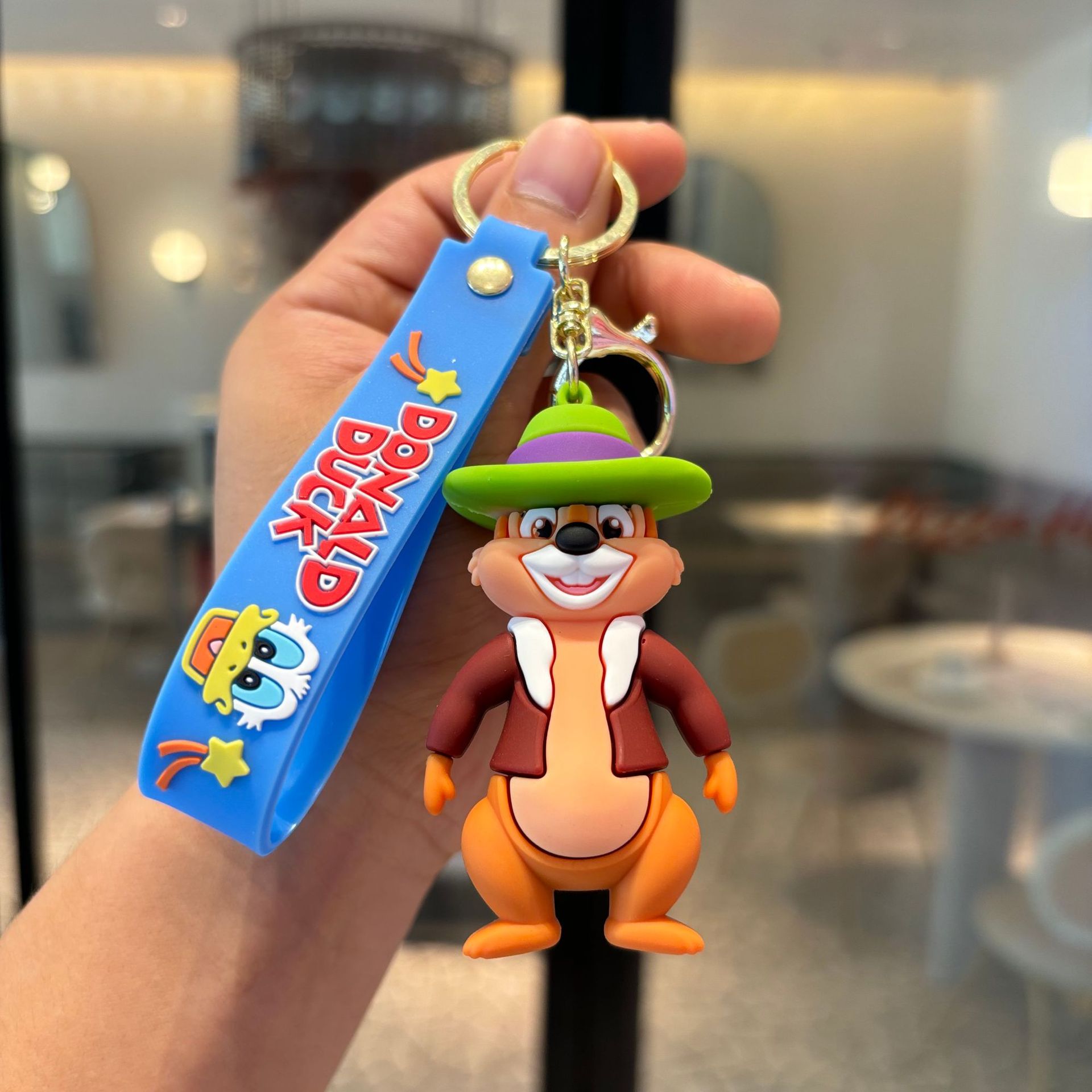 Caricatura de dibujos animados Donald Pato llavero Daisy adorable muñeca colgante accesorios para automóviles agarrador pequeño regalo al por mayor