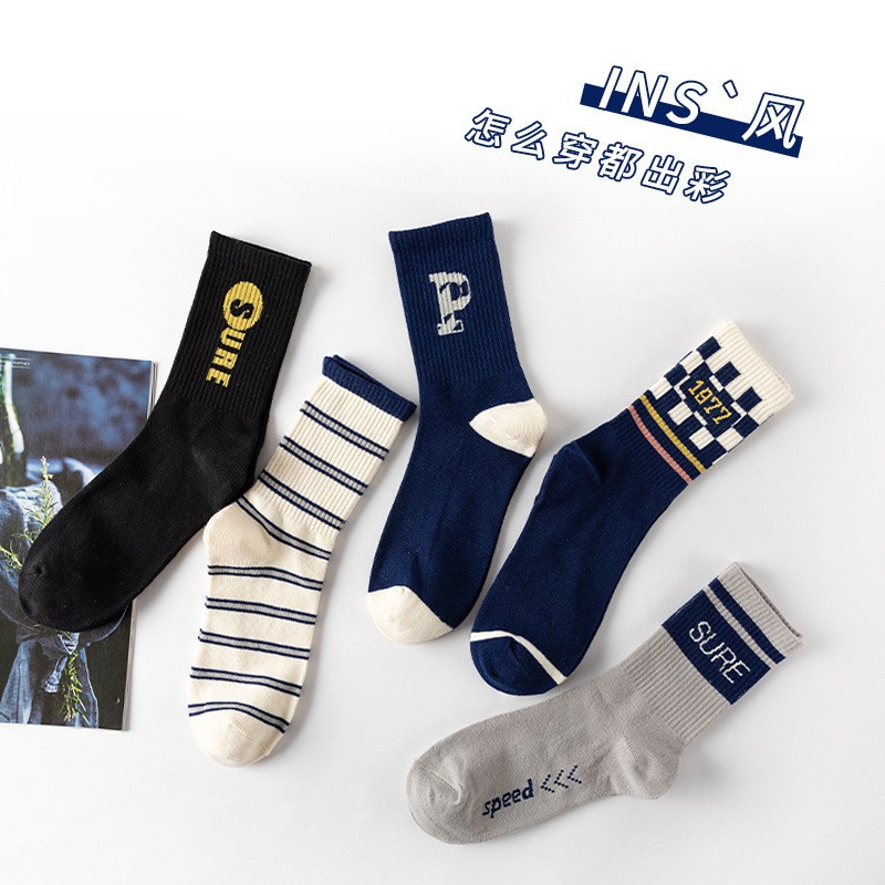 Primavera y otoño invierno estriado unidireccional calcetines de algodón medio P letras de moda de color sólido calcetines deportivos de algodón al por mayor