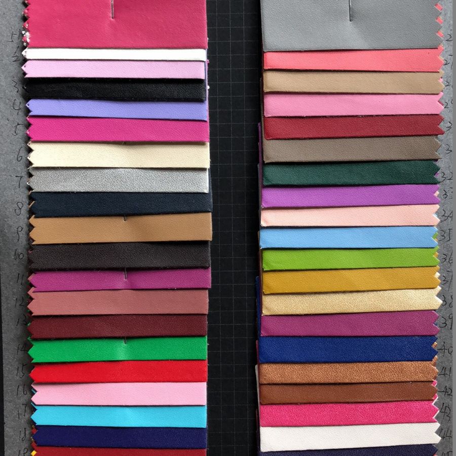 100纹水刺PU皮革面料水刺无纺布底PU0.4-0.5包装盒电子材料人造革