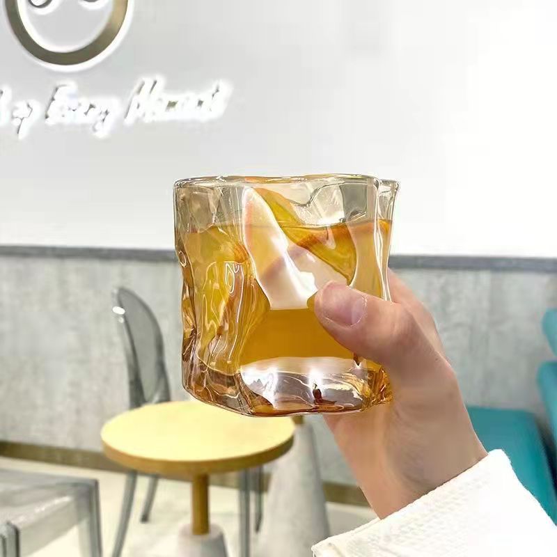 INS café universal de forma especial trenzado taza de agua productos de vidrio transparente taza de leche regalos de apertura puede ser al por mayor