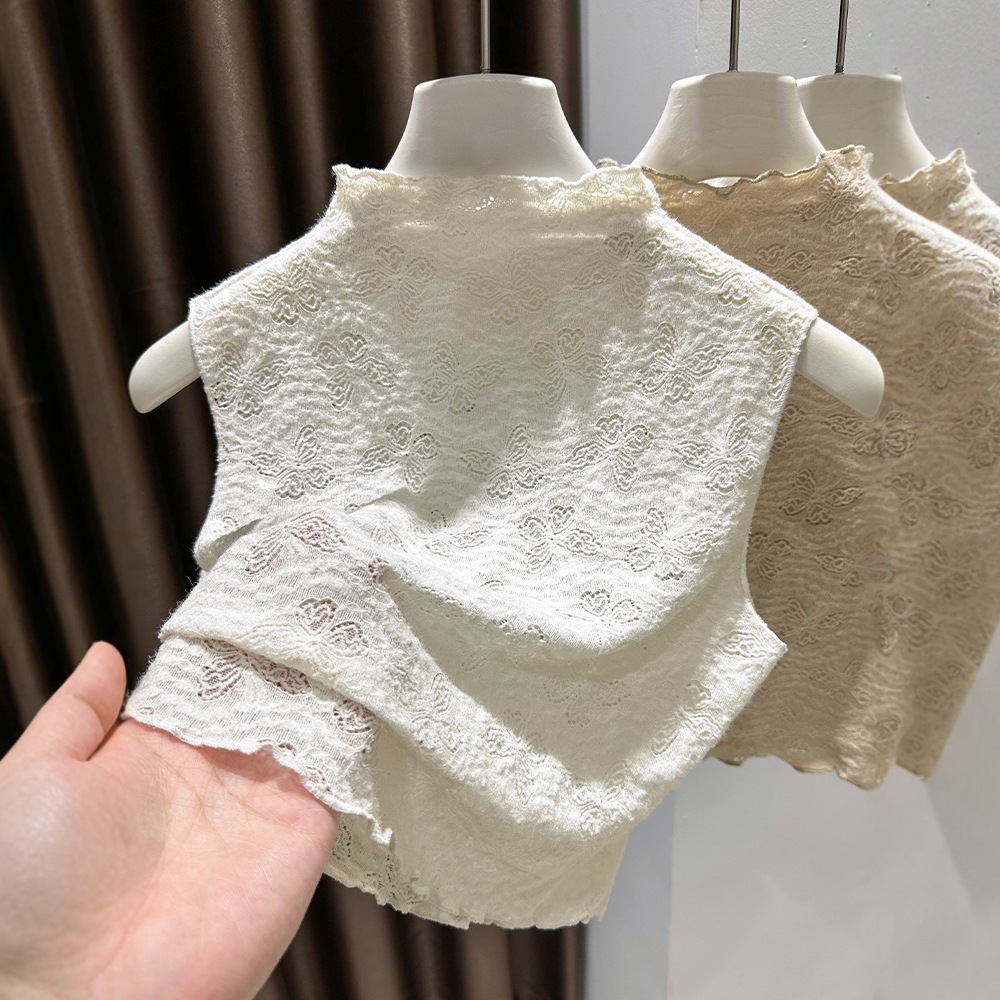 Ning Xinyi's high-neck lace top with ruffled trim, a versatile base layer top with a faux collar, and a sleeveless vest.