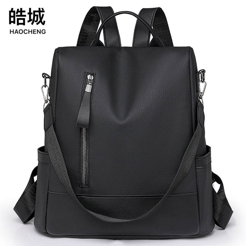 Spot wholesale 2024 nueva mochila antirrobo para mujer, mochila de viaje multifuncional de color sólido simple, mochila escolar