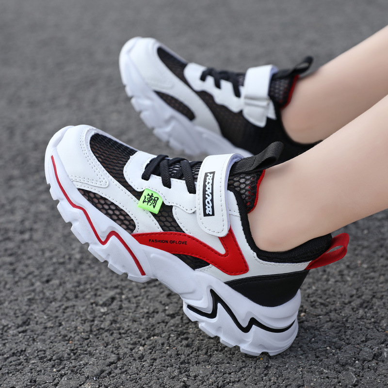 Zapatos para niños 2026 primavera nueva malla transpirable para niños con suela suave ligera para estudiantes de primaria para correr zapatos deportivos para niños