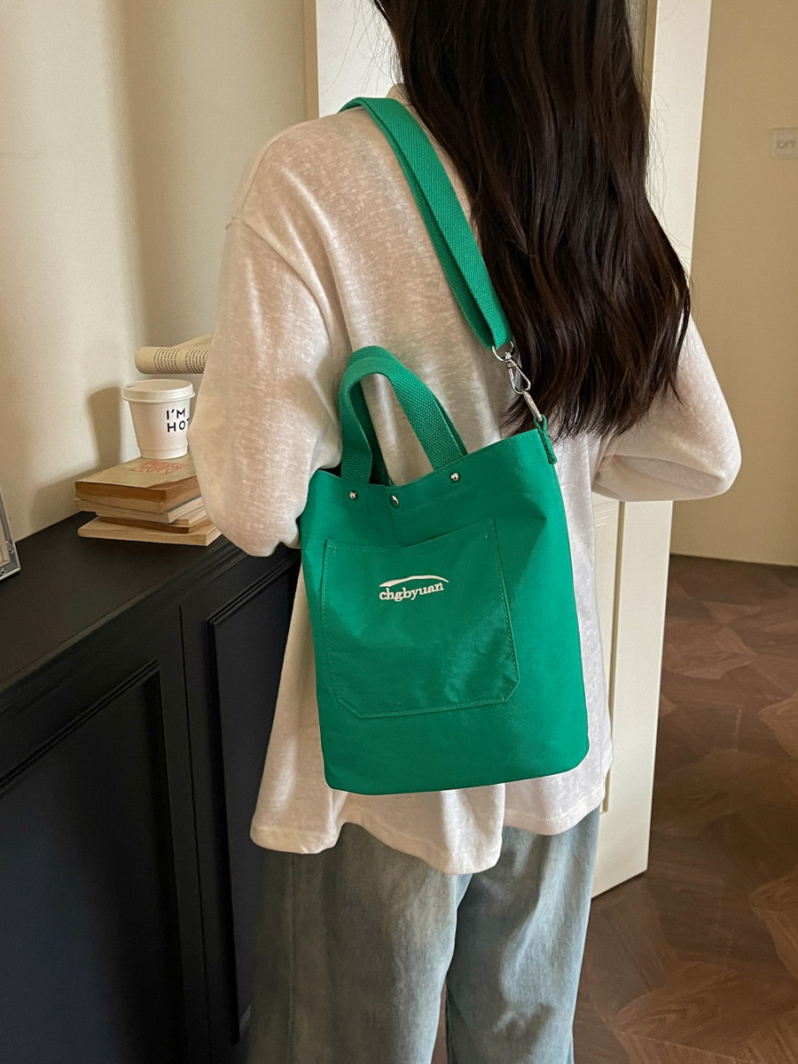 Bolso de mano de gran capacidad para mujeres 2026 verano nuevo estilo coreano simple mochila de hombro de viaje bolsa de ocio