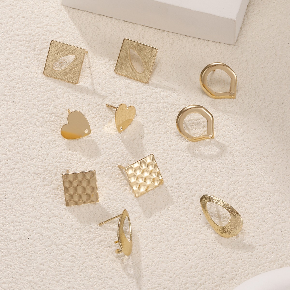 Los aretes de bricolaje hechos a mano de los aretes irregulares de los fabricantes de origen se pueden personalizar para accesorios geométricos de galvanoplastia de aguja de plata 925