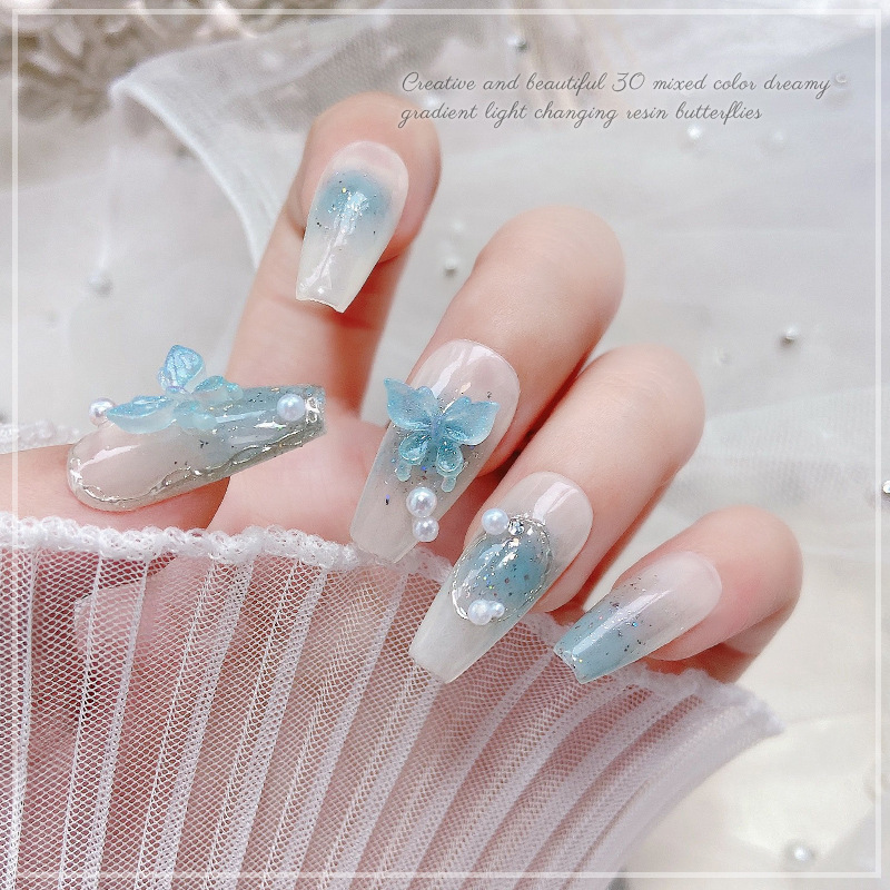 30 nail art luz cambiante resina tridimensional mariposa joyería nueva red rojo Hada color mágico mariposa estricta selección de uñas de diamantes decorativos