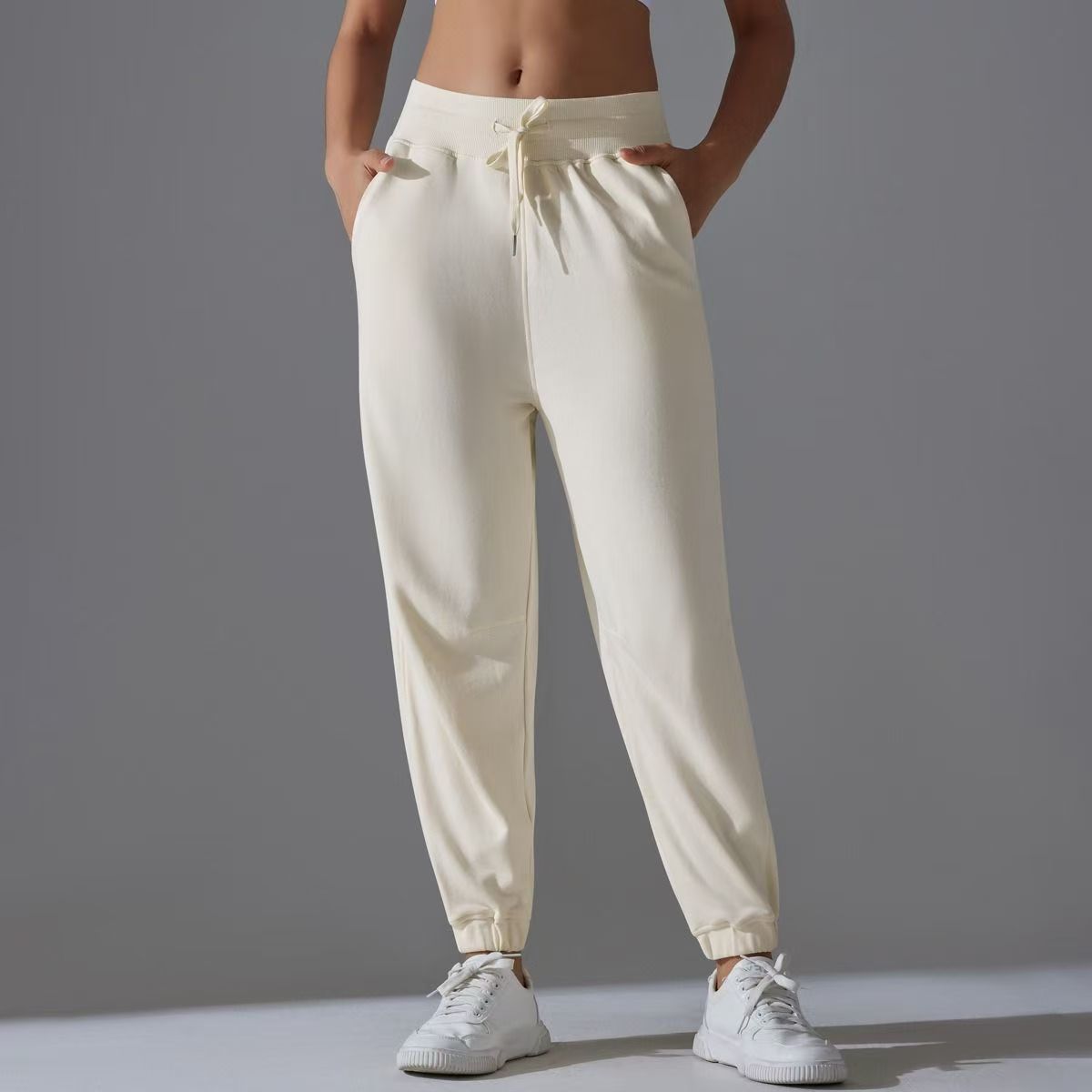 Nuevos pantalones deportivos de alta elasticidad de tracción de ropa de mujer, pantalones de entrenamiento sueltos transpirables, pantalones de entrenamiento de nueve puntos