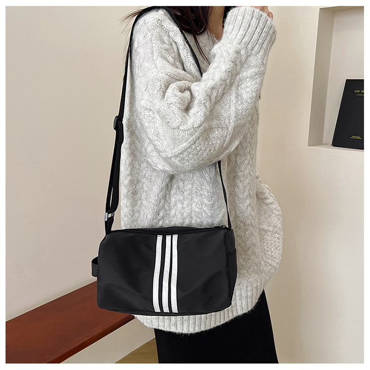 165g Weight Polyester Lining Material Sewing Thread Fashion Element Zipper Closure Type Single Shoulder Strap Strap Type Crossbody Bag Bags Type Daily, Sports Occasion Nylon Material Solid Color Pattern All Seasons Season Women's Gender Classic Style Style Cylindrical Shape Medium Size Women's Medium Nylon Solid Color Classic Style Sewing Thread Cylindrical Zipper Crossbody Bag 1