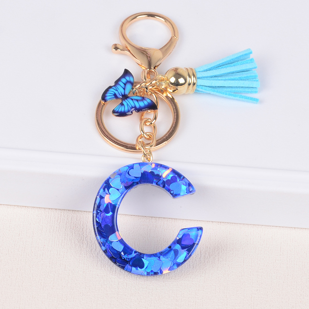 Cross-border Hot Sale 26 letras inglesas llavero de resina de goteo de goma esquinilla llavero de letras de amor personalizado