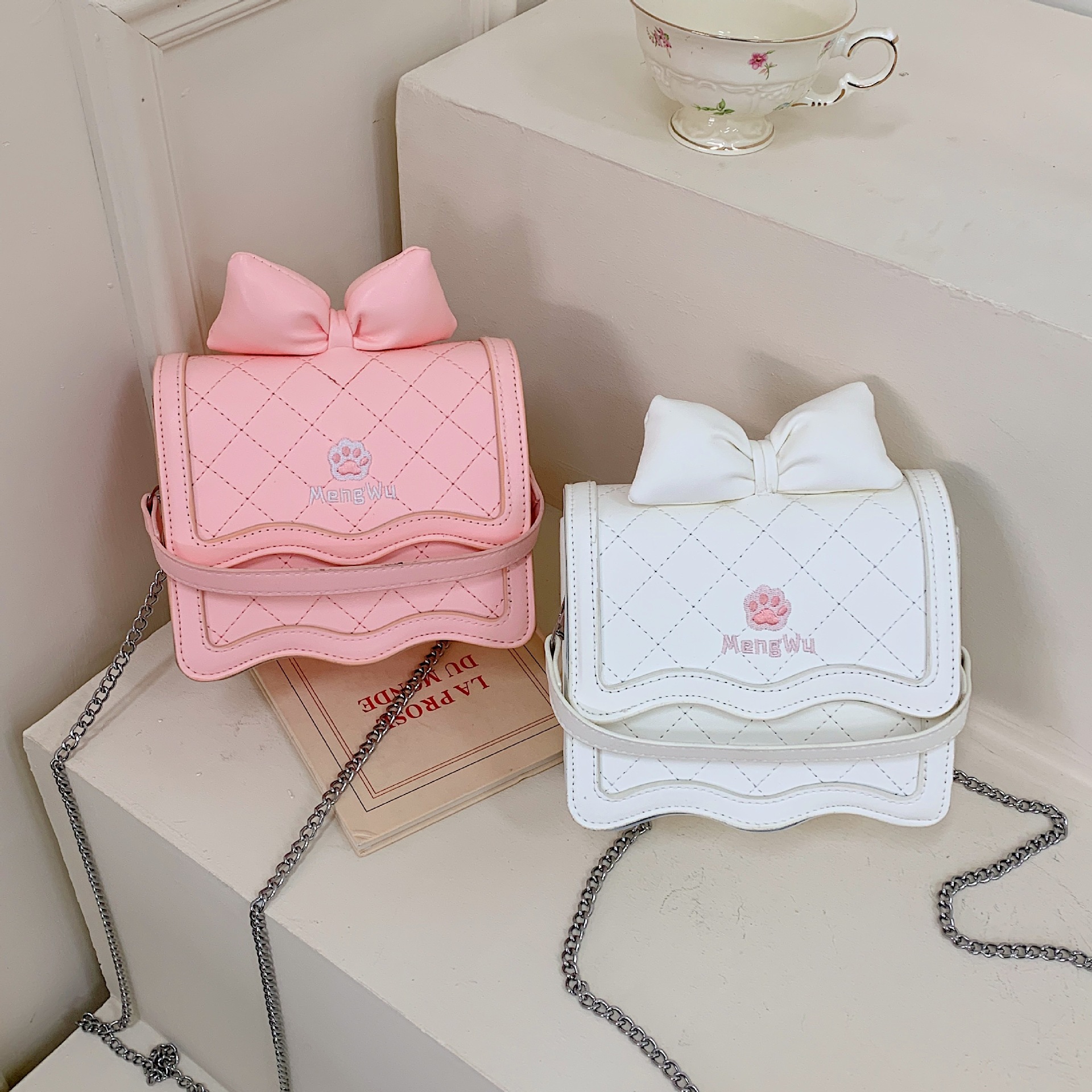 Bolsos de hombro de chicas lindos con arco extranjero bolsas de cadena bordadas de diamante coreanas nuevas bolsas de niños transfronterizas
