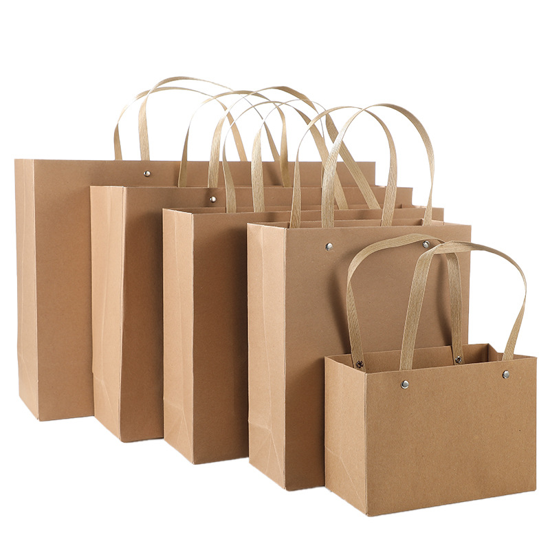 新款铆钉排绳牛皮纸袋服装店购物手提袋开业礼品袋礼物包装袋批发