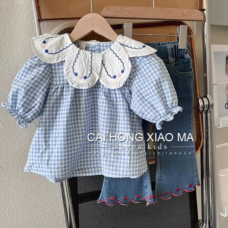 Estrella de niños niñas camisa a cuadros fresca 2025 nuevo estilo de moda camiseta de primavera y otoño set