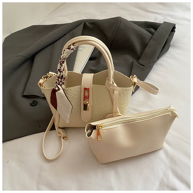 Bolsa de tejido para mujeres 2025 nuevo estilo de alto nivel de verano bolso de hombro para mujeres bolso de cubo de mano
