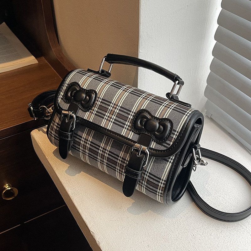 2025 otoño y invierno nuevo estilo británico bolso de mano casual versátil bolso de hombro a rayas bolso de viaje coreano