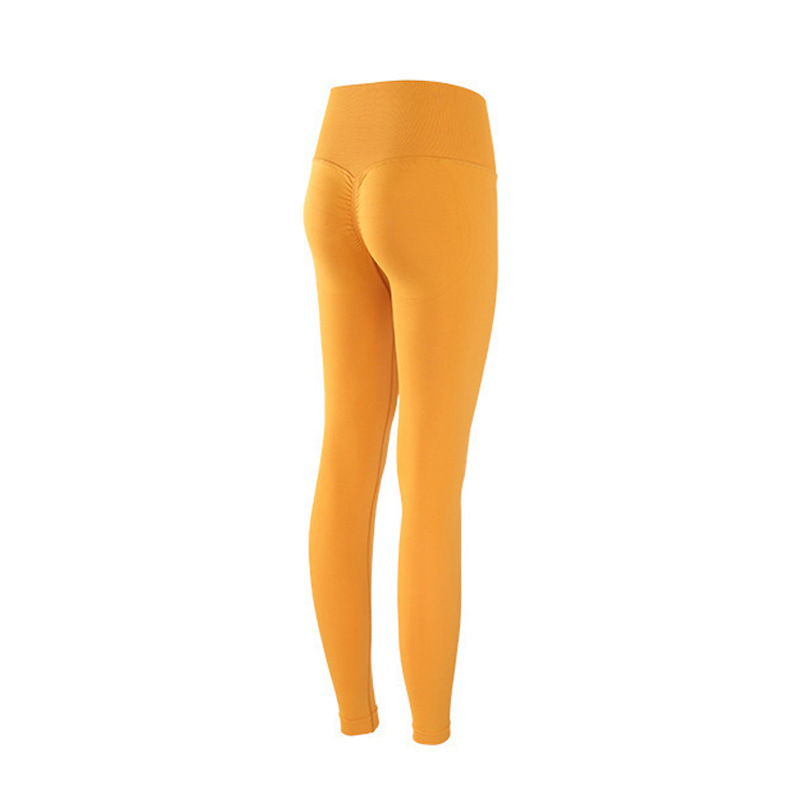 Pantalones de gimnasio sin costura europeos y estadounidenses, cintura alta, abdomen, caderas, pantalones de melocotón para correr, yoga, leggings apretadas