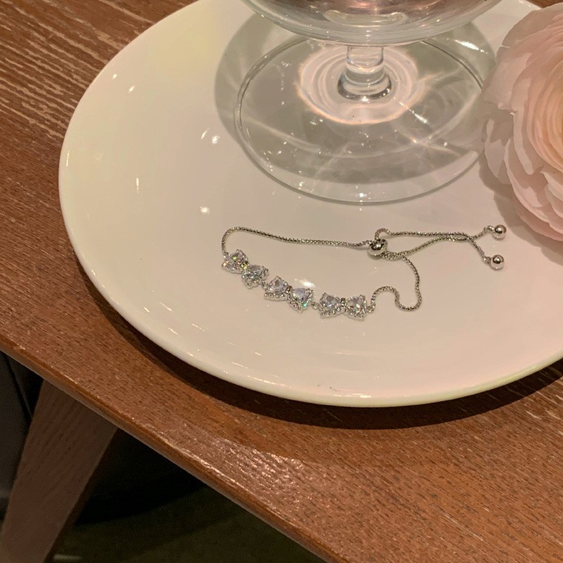 Pulsera de amor solar de circón galvanizado en oro real