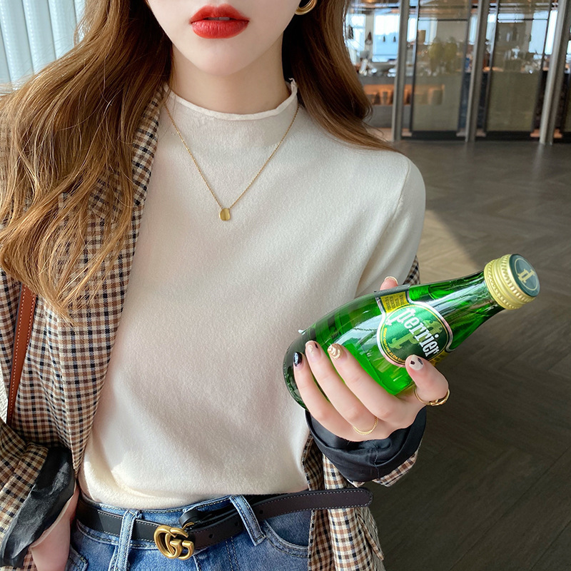 韓国版秋冬半高襟のニットの女性の薄いタイプの洋風の新型の中にセーターの長袖の上着を掛けて外に着ます。|undefined