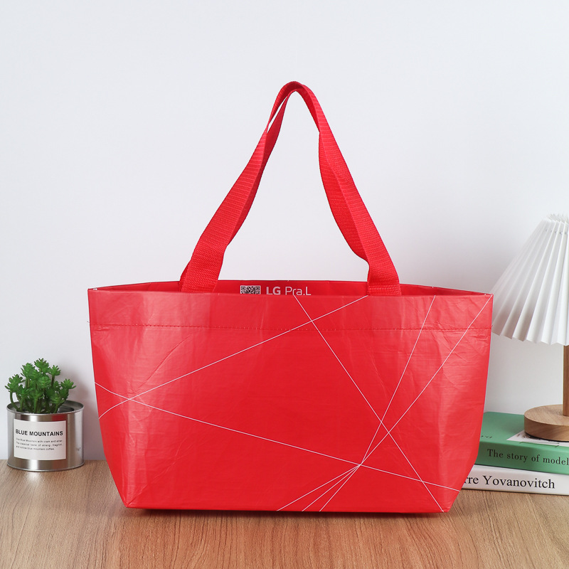 红色淋膜丽新布手提袋编织服装无纺布购物袋覆膜新丽布广告礼品袋