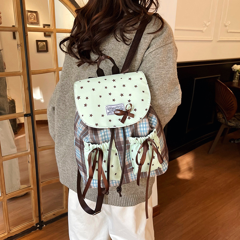 Mochila coreana de moda, mochila de gran capacidad para mujeres, mochila de estrellas, mochila de estudiantes de arco dulce.