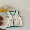 Green vest, with little bears
