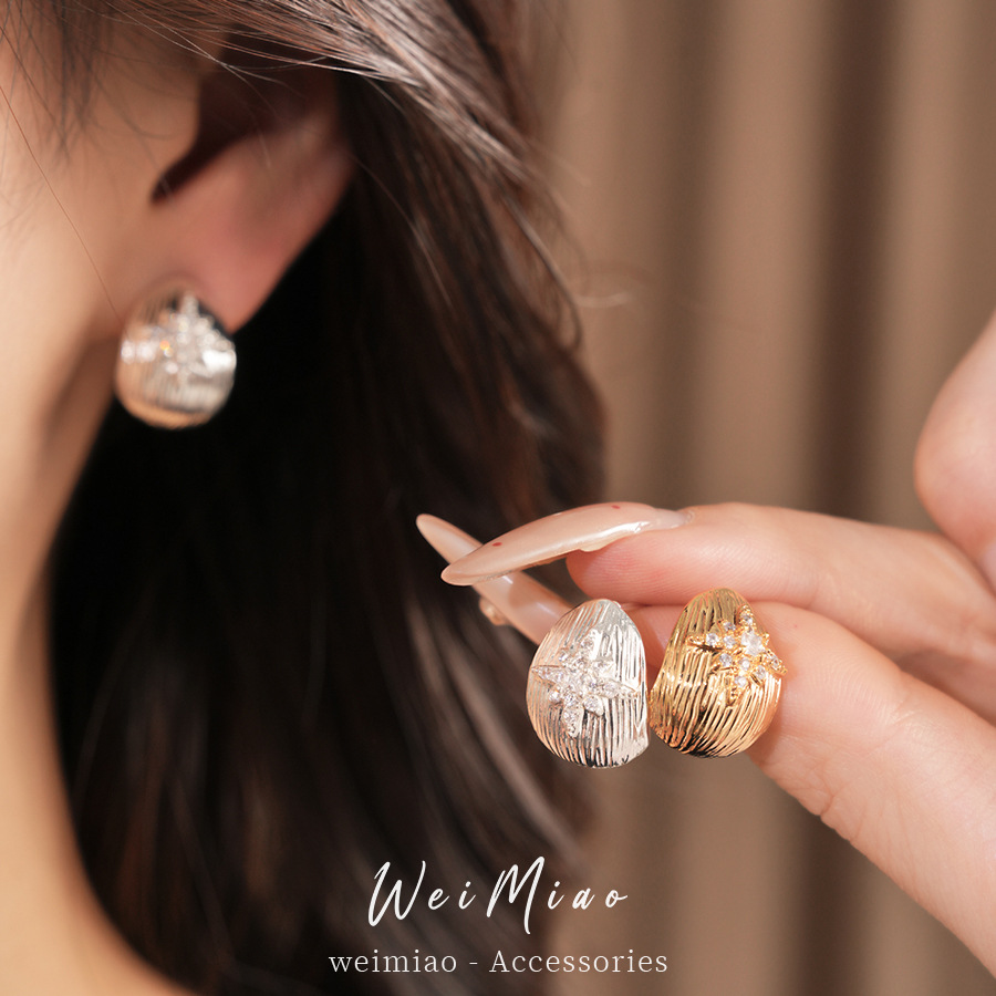18k oro real chapado agujas de plata zircon flores gotas de agua pendientes de aretes personales de aire frío pendientes de aretes de lujo ligero de alto nivel