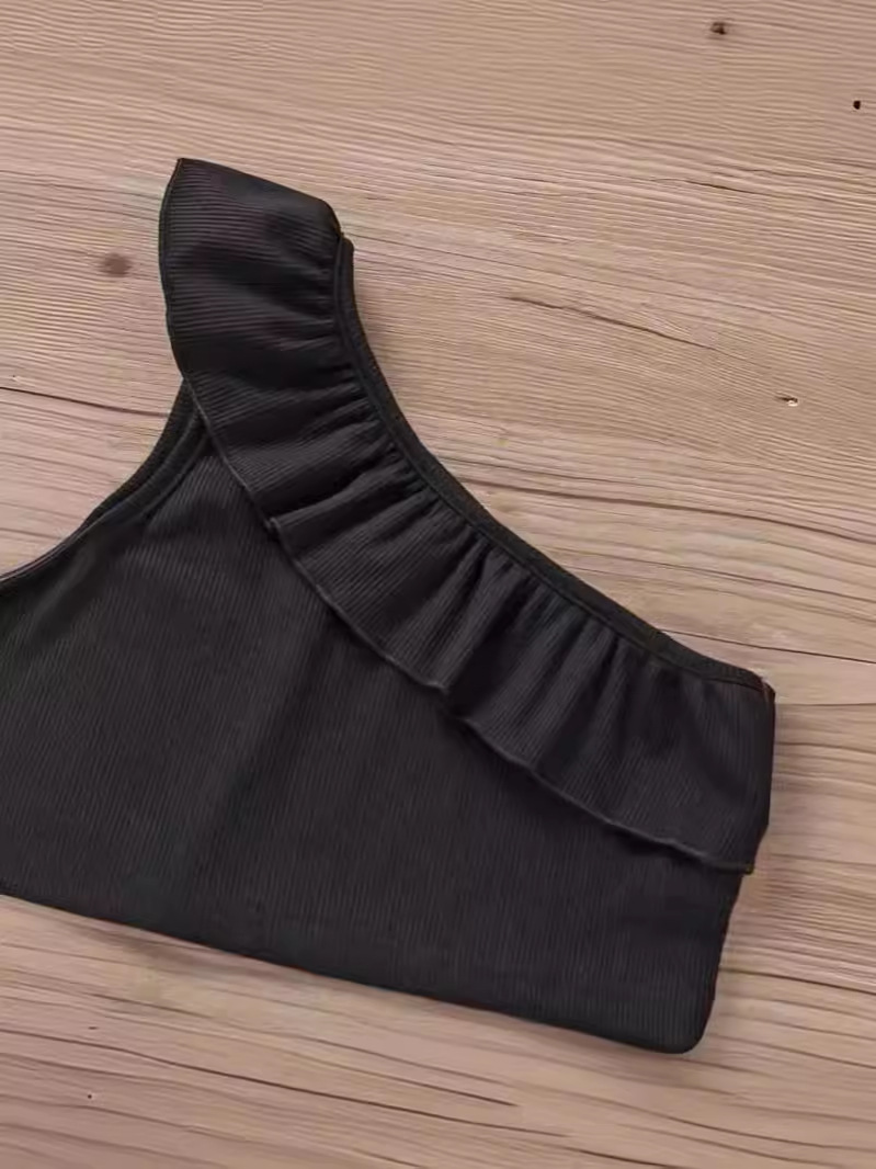 Niñas de verano bebé extranjero estilo de moda personalidad de niños coreano corto encaje hombro abierto chaleco de hombro irregular