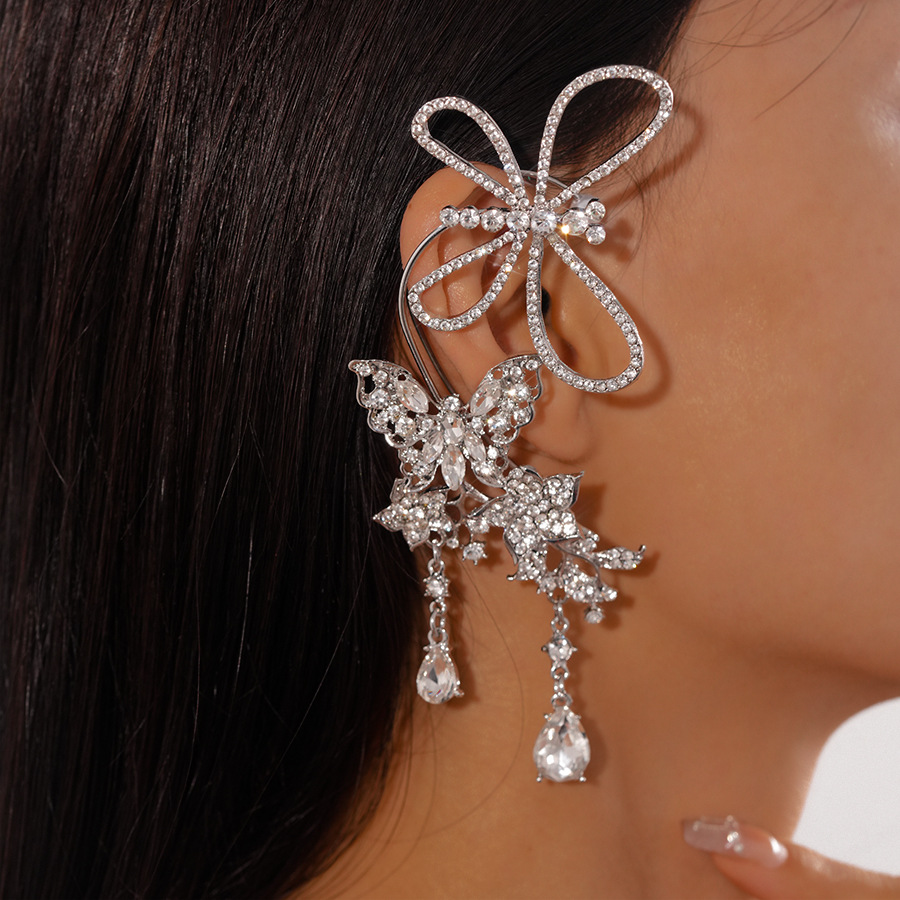 Súper destello y luz, estilo de lujo, mariposa con incrustaciones de diamantes, gotas de agua, orejas huecas, sin perforaciones, personalidad, temperamento de nicho, pendientes de sentido avanzado, mujeres