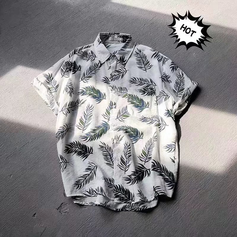 Estilo retro de Hong Kong Ruan guapo camisa de seda de hielo abrigo ropa de los hombres Hawaii playa floral camisa de manga corta de los hombres sueltos más tamaño