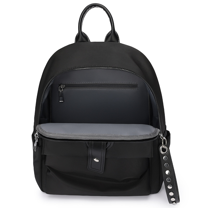 2024 verano nueva mochila de tela Oxford para mujer, color sólido, simple y ligero, mochila de viaje de viaje, mochila escolar al por mayor