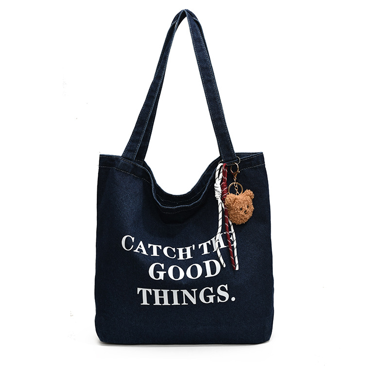 Bolsa de vaquín casual americana para estudiantes universitarios de clase viaje de compras letras de viento perezoso portátil gran capacidad bolso de hombro