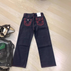アメリカのヒップホップの大きい刺繍のファッションブランドのスケートボードのデニムのズボンのゆったりした高い街のまっすぐな筒の街頭のカジュアルな広い足のズボン