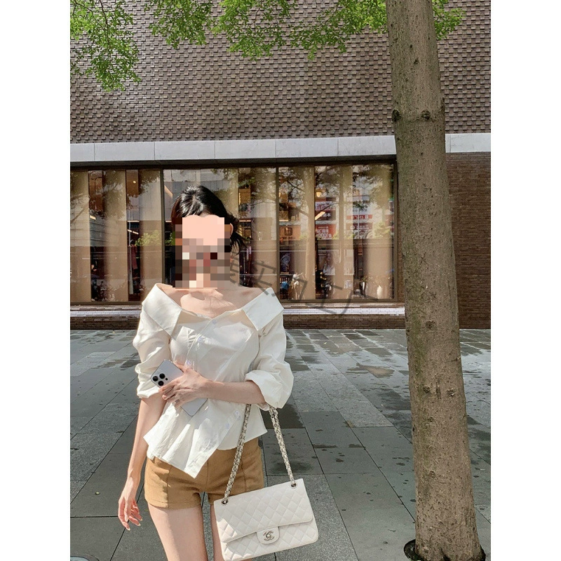 白色露肩长袖防晒衬衫女春季不规则气质衬衣设计感修身短款小上衣